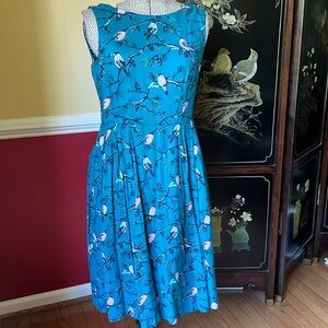 Small Emily and Fin Penny dress in A Little Bird Told Me Print